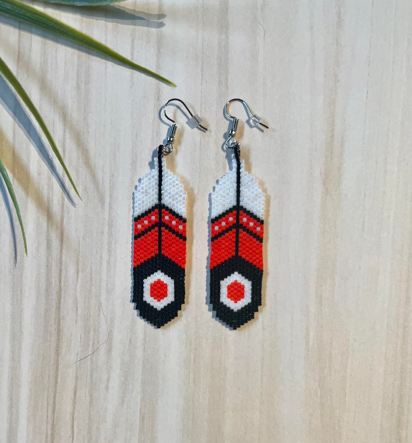 Beaded feathers earrings